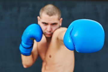 Boxer in blue gloves