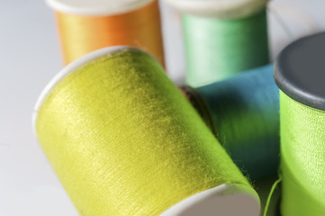 colored thread spools of thread