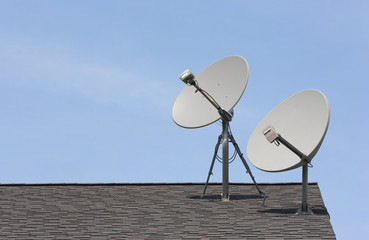 Wireless satellite dishes on roof.