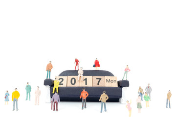 Crowd of people with Wooden block Word 2017  on white background