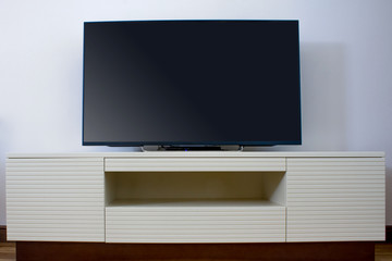 Led TV on TV stand 