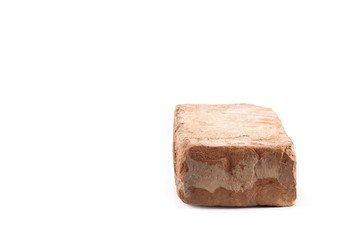 Old red brick isolated on white 