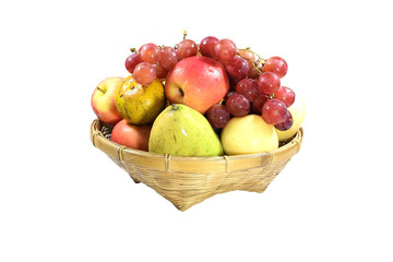 Fruits of other species in a bamboo basket isolated on white background.