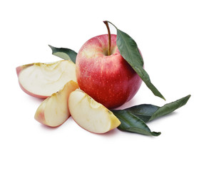 Whole red apple with leaves and slices