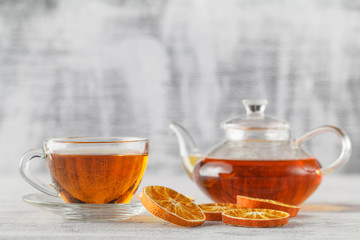 DIY winter composition with dried orange, tea glass