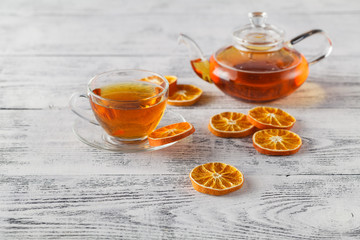 DIY winter composition with dried orange, tea glass