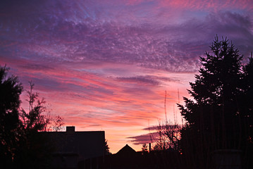 Evening alpenglow in winter above the village
