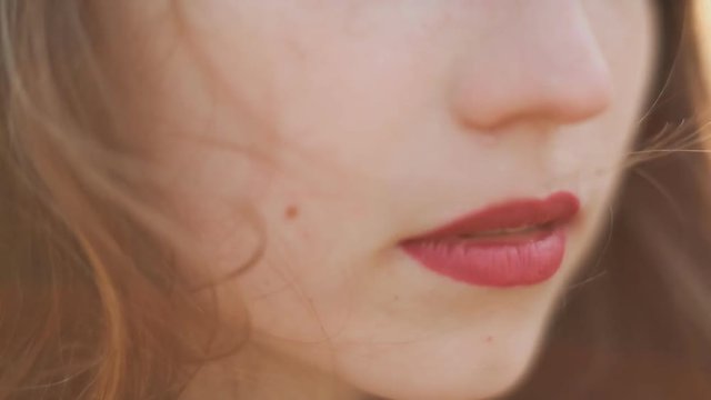 Look of a beautiful fifteen year old girl close up. Makeup, freckles.