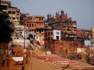 City of India, bright houses, signs and people in the streets.