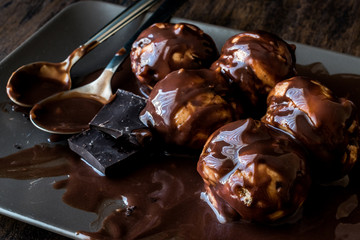 Profiteroles with chocolate cream.