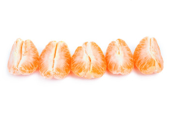 Peeled mandarin and slices isolated on white background