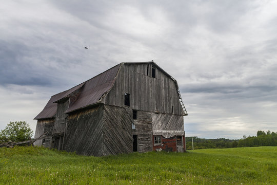 old barn in a field