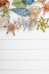 Christmas decoration on wooden white backround. Winter holidays concept. Space for text.