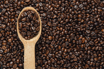 Coffee Beans in wooden spoon