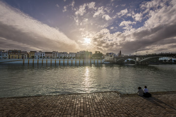 Fototapeta premium View of Guadalquivir river and Triana district in Sevilla, Andalusia, Spain