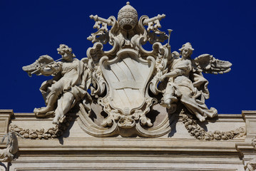 Fototapeta na wymiar Trevi Fountain papal coat of arms, Rome