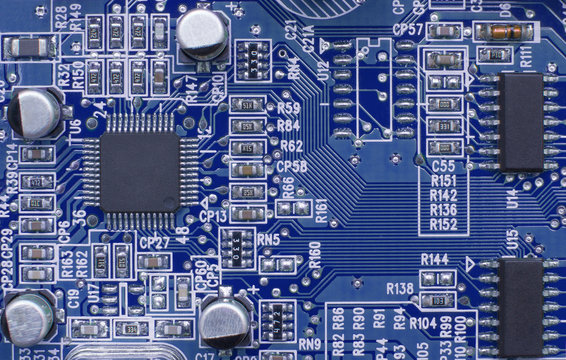 Printed circuit board with electronic components. Computer and technology concept. Toned image.