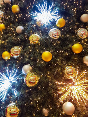 Fototapeta na wymiar Christmas ball on fir tree