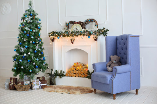 Christmas light interior with fireplace