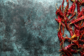 Red chili pepper,dried chillies on dark background. top view