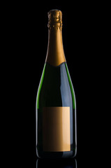 Champagne bottle with gold label on black background