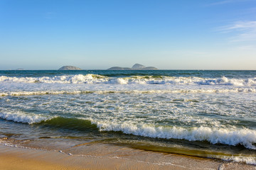 The sea, islands and horizon of Ipanema beach in Rio de Janeiro