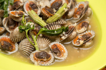 Scallops mussels baked with butter and garlic in shell