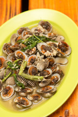 Scallops mussels baked with butter and garlic in shell