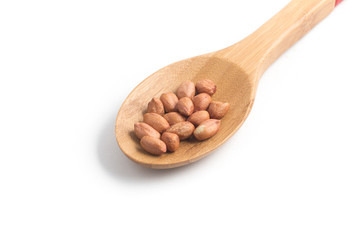 Peanuts pile. Shell Seeds into a spoon
