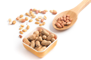 Peanuts pile. Shell Seeds into a spoon