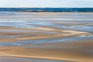 Sea coast at low tide, Saint Michael's, France - Powered by Adobe