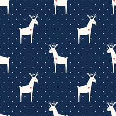 Deer with heart seamless pattern on polka dots blue background. Xmas animal background. Child drawing style animal illustration. Cute holidays design for textile, wallpaper, fabric. - 129711464