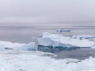 glaciers are melting on arctic ocean in Greenland