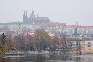 Panorama of an old Prague, bridges and embankment of Vitava river, Czechia