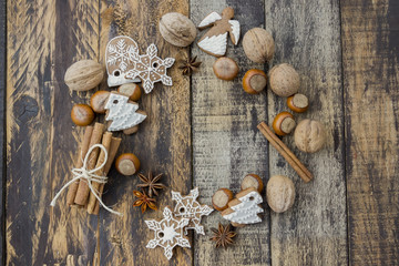 Christmas wreath with ginger cookies, nuts, cinnamon and anise