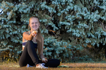 young girl resting sitting on the grass