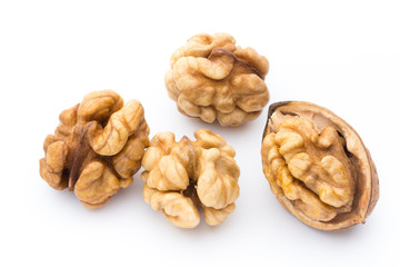 Walnut and walnut kernel isolated on the white background.