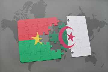 puzzle with the national flag of burkina faso and algeria on a world map