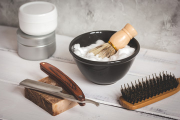 Wooden desktop with tools for shaving beards