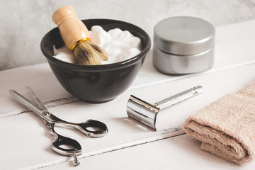 Wooden desktop with tools for shaving beards