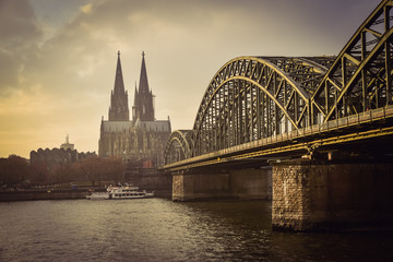 Cologne Cathedral and Hohenzollern Bridge at sunset / nighttime