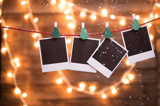 Empty instant photos with garland