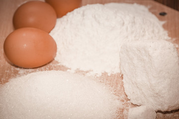 flour eggs sugar salt. ingredients for baking. close-up. cooking. confectionery. Concept from alfaphotorus