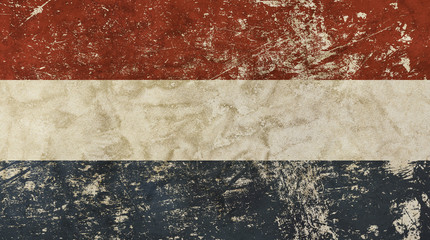 Old grunge vintage faded flag of Netherlands