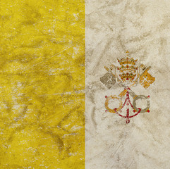 Old grunge vintage faded flag of Vatican City