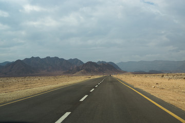 The scenic asphalt road in the desert