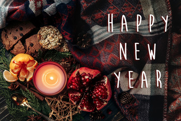 happy new year text sign on stylish christmas flat lay with cand