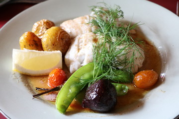 Fish pike perch with potatoes, beetroot and pea pods in Sweden, Scandinavia