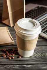 coffee cup take away at wooden background