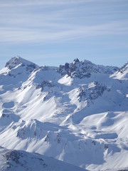 Winter snow covered mountain peaks in Europe. Great place for  s
